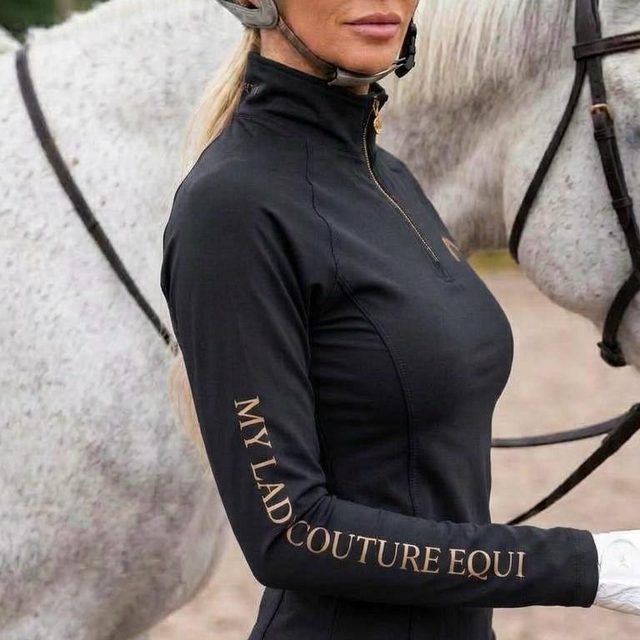 Close-up of the black My Lady base layer with gold sleeve lettering